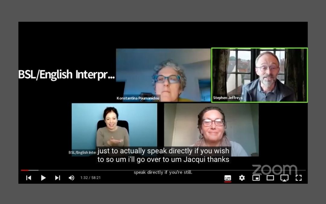 still from the YouTube video showing panellists and BSL interpreter